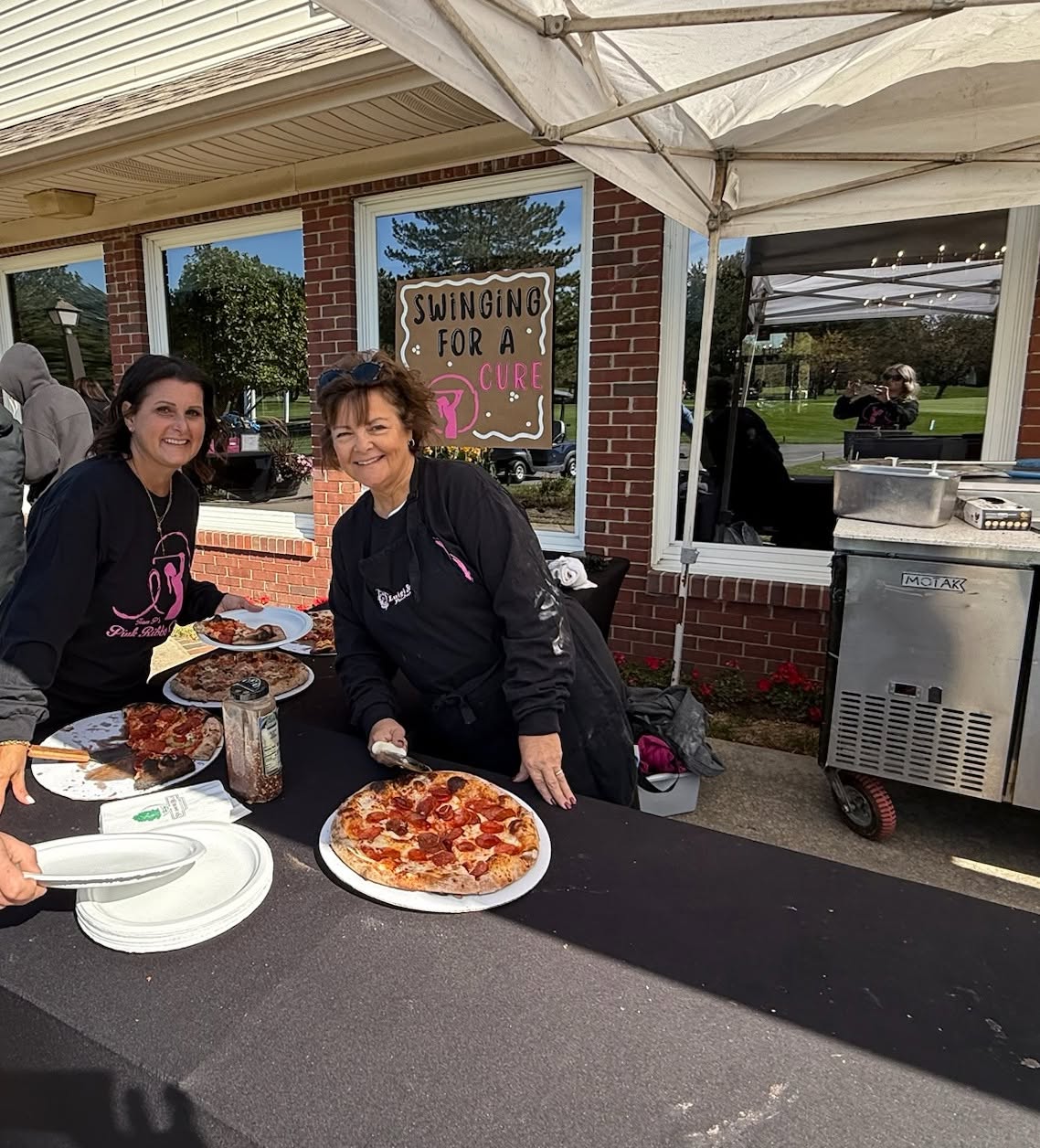Volunteers serving lunch